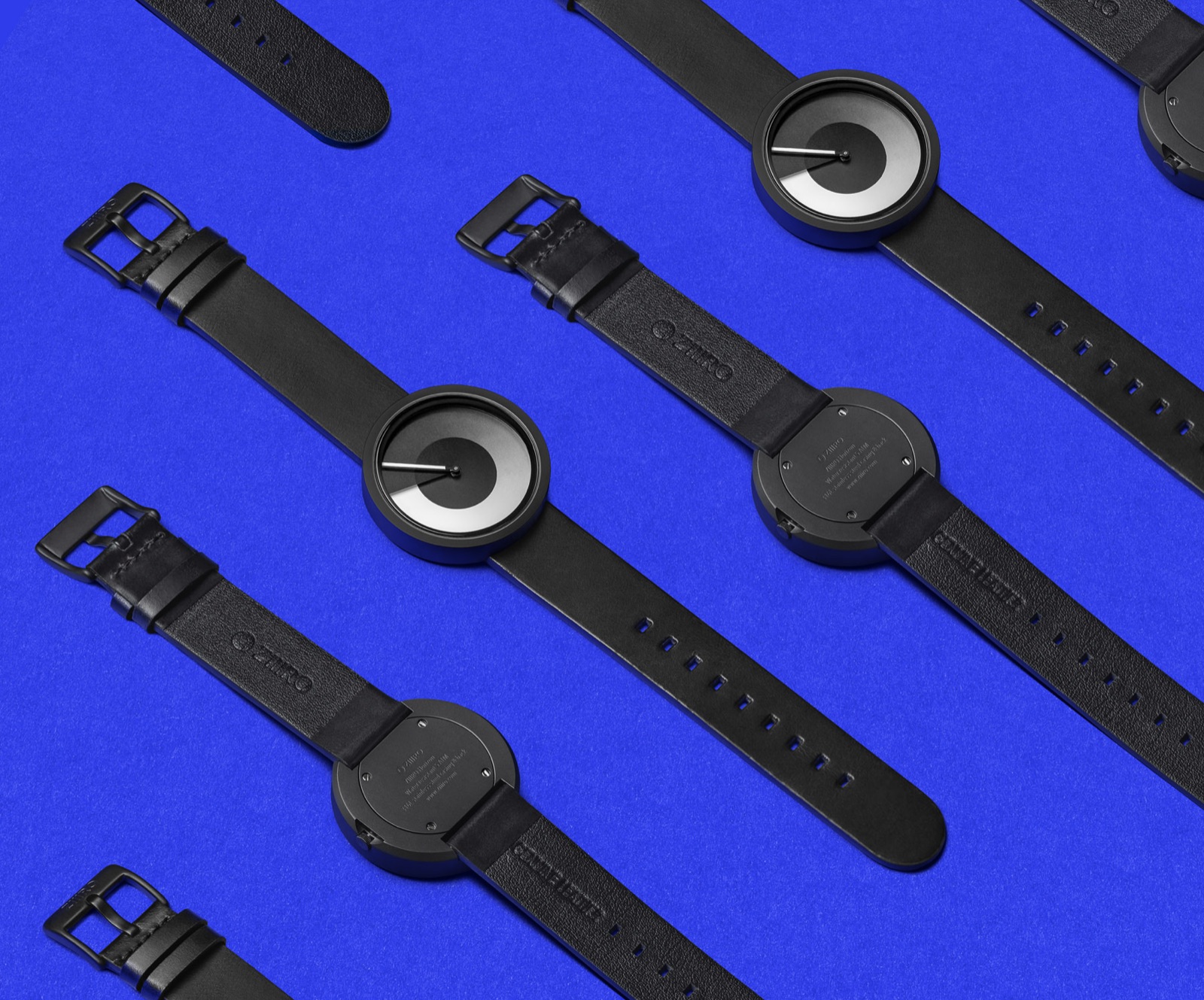 Blue ZIIIRO Horizon watch on wet stone