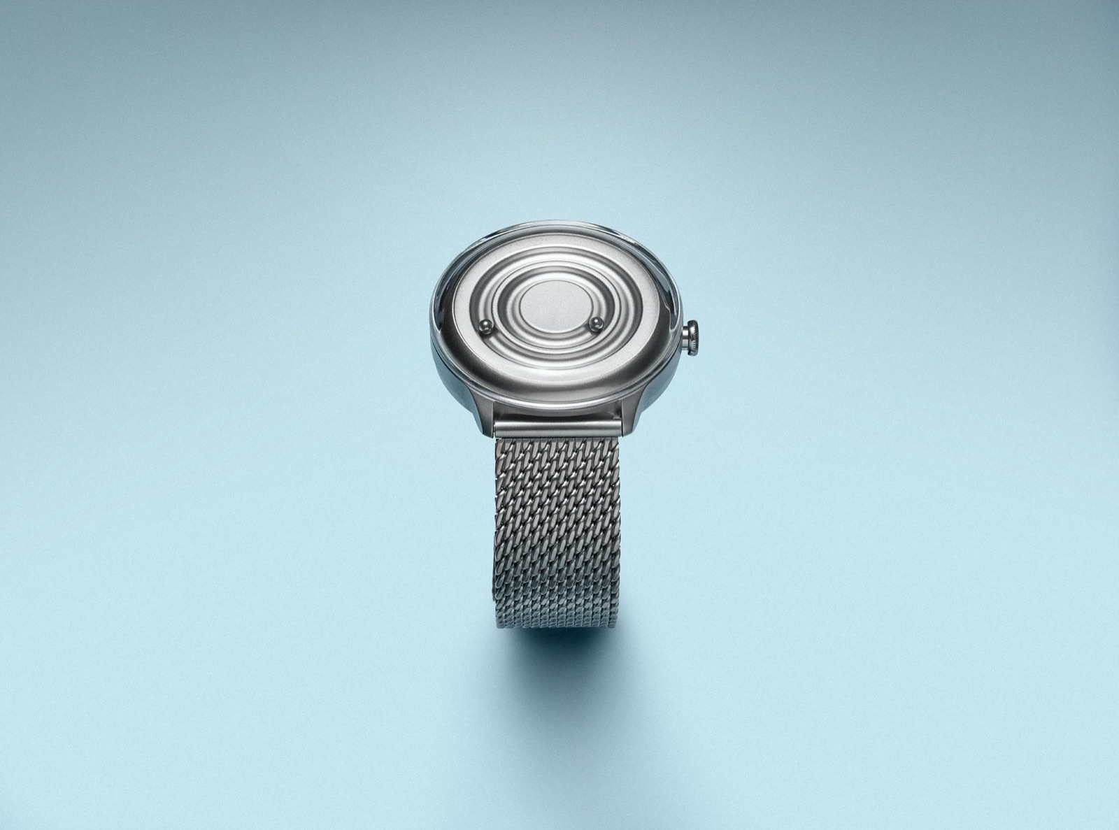 Silver ZIIIRO Jupiter watch on green fabric