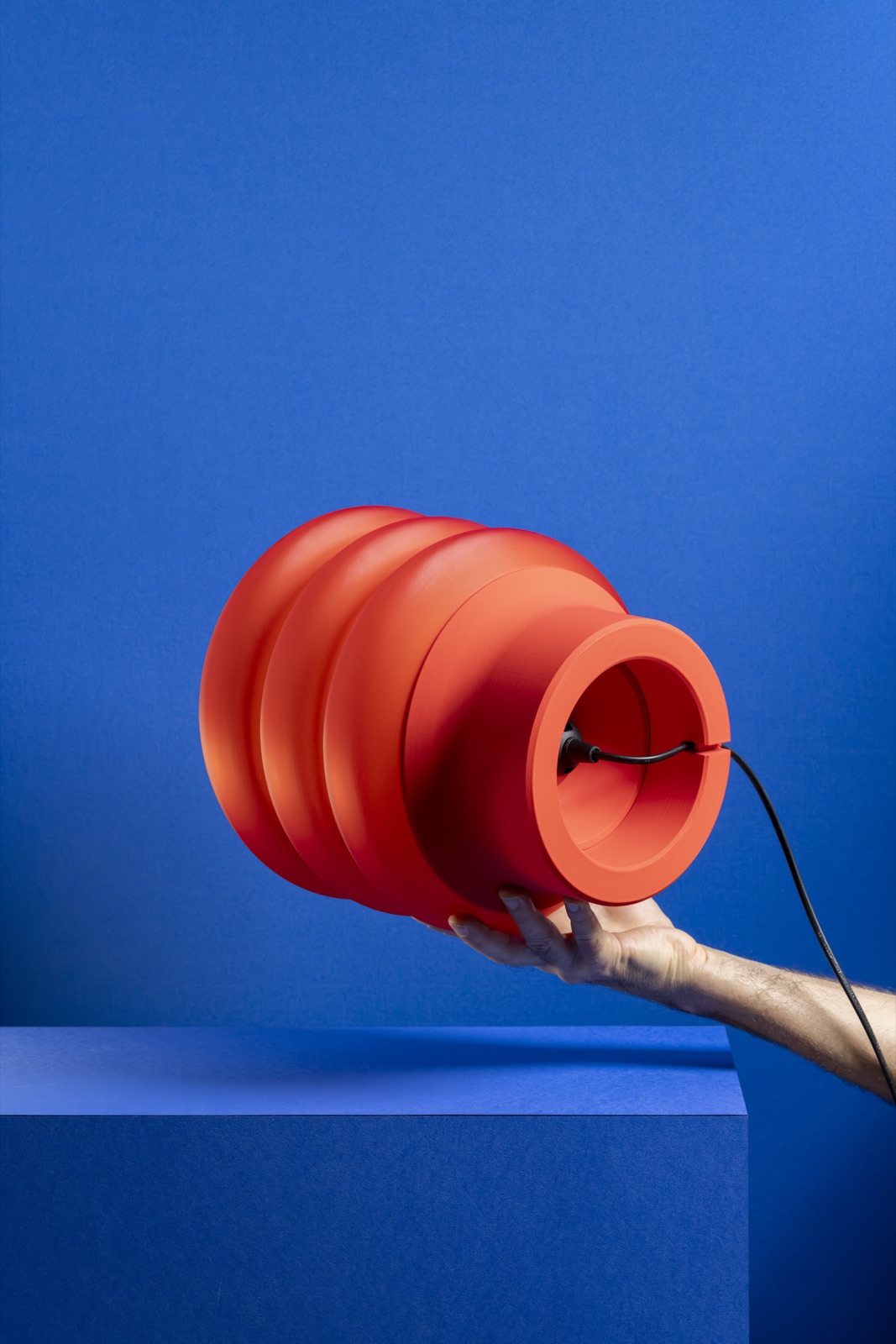 Modo lamp on a stack of books