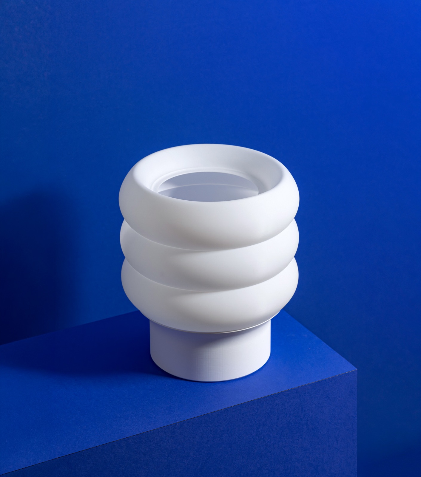 Modo lamp glowing in a dark room