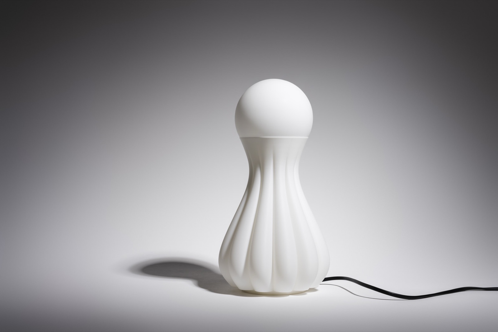 Poise floor lamp detail against daylight