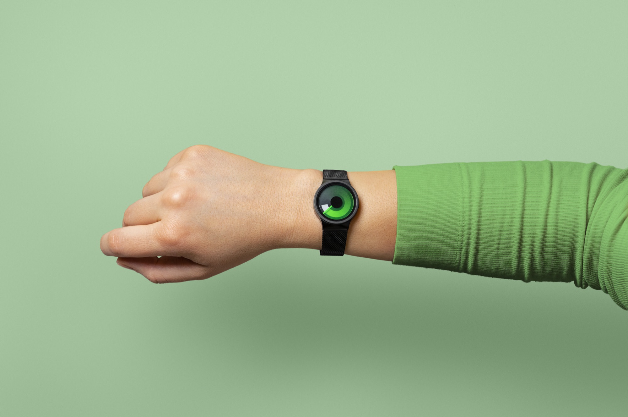 ZIIIRO XS watch editorial in black and green, wide view